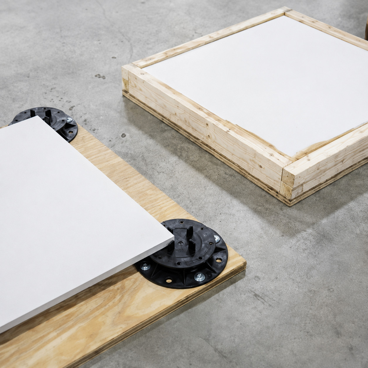 Gauged porcelain pavers set on pedestal supports for structural testing